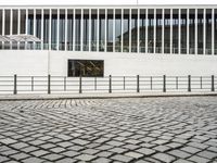 Berlin, Germany: Modern Architecture and Cobblestone Streets at Dawn