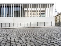 Berlin, Germany: Modern Architecture and Cobblestone Streets at Dawn