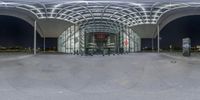 the entrance of an indoor convention center is seen in this photo, with a fisheye lens