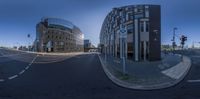 this is an image of a modern city street view taken from the inside out of a fish eye lens