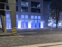 Night cityscape of Berlin, Germany with illuminated buildings and roads