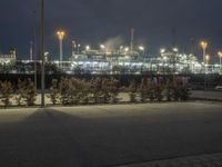 a long exposure view of the power plant at night in the foggy, outcropped area