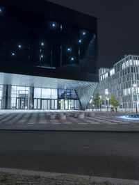 this is an image of the outside view of a building at night / night time