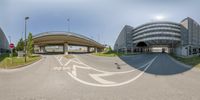 three different angles of a road near a bus station and highway and a building with three curves in the foreground