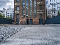 an empty parking lot with a sign that reads brick lane and the name park on it