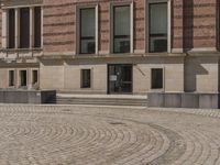 Berlin, Germany: Urban Building on Cobblestone Street