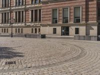 Berlin, Germany: Urban Building on Cobblestone Street