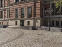 Berlin, Germany: Urban Building on Cobblestone Street