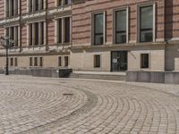 Berlin, Germany: Urban Building on Cobblestone Street