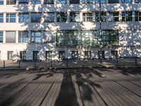 the sun is shining on the exterior of this large apartment building in london, england