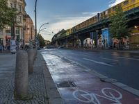 the view under the highway, on a rainy day of the city street and on the streets with buildings and bicycles