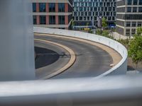 a car is driving on the highway through an underground parking garage area in a city