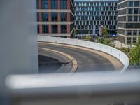 a car is driving on the highway through an underground parking garage area in a city