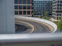 a car is driving on the highway through an underground parking garage area in a city