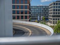 a car is driving on the highway through an underground parking garage area in a city