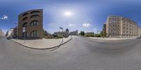 a view of a small city street from the 360 - vision lens of the camera