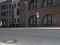 the street sign is indicating that no parking at this corner is empty and empty on all sides