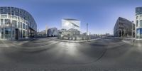 the street and buildings are shown at different angles in this image - glassy architecture, with curvedly curves