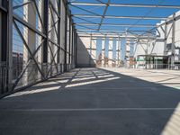 the inside of an industrial building with steel mesh around the outside and metal framed windows