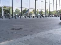 the black car is parked in the middle of the sidewalk with the circle of the word'i love you '