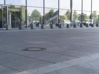 the black car is parked in the middle of the sidewalk with the circle of the word'i love you '