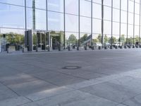 the black car is parked in the middle of the sidewalk with the circle of the word'i love you '