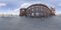 an image of a building in a 360 - angle position taken on a skateboard