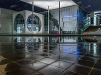 Berlin Nightscape: Illuminated River and Modern Architecture