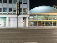 Berlin's Nighttime City: Reflections of Modern Architecture