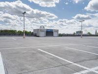 an empty parking lot with no parking spaces or equipment to pick up people on the street