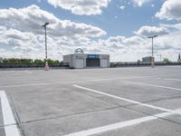 an empty parking lot with no parking spaces or equipment to pick up people on the street