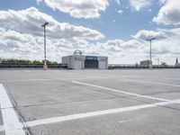 an empty parking lot with no parking spaces or equipment to pick up people on the street