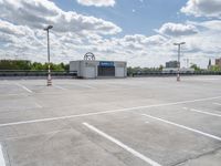 an empty parking lot with no parking spaces or equipment to pick up people on the street