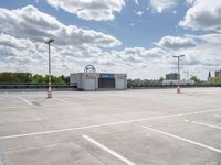 an empty parking lot with no parking spaces or equipment to pick up people on the street