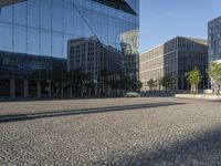 Berlin Plaza: Glass Walls and Surface Reflections