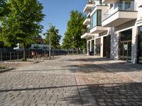 a large building has many windows and doors on both sides of the walkways, which also look very nice