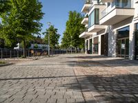 a large building has many windows and doors on both sides of the walkways, which also look very nice