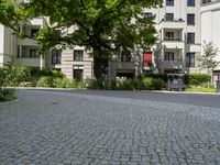 Residential Area in Berlin: Traditional Cobblestone Roads and Modern Living