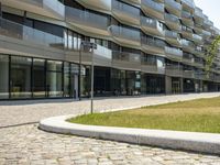 the curved facade of the modern office building by architect jean kollbach and design firm