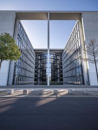 Berlin Road: Asphalt, Shadow, and Reflection