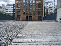 City Life in Berlin: A Brick Wall on the Road