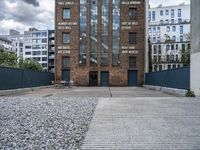 City Life in Berlin: A Brick Wall on the Road