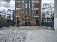 City Life in Berlin: A Brick Wall on the Road