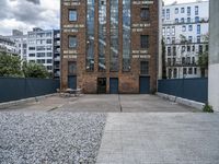 City Life in Berlin: A Brick Wall on the Road