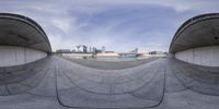 this is an image of a skate park taken with two small fisheyes to give it a 360 lens