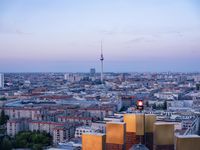 the view of berlin, taken from atop the eiffel tower in germany at dusk