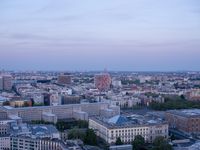 the view of berlin, taken from atop the eiffel tower in germany at dusk