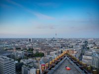 the view of berlin, taken from atop the eiffel tower in germany at dusk