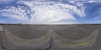 there is a fish eye lens looking up at a runway as planes take off from it