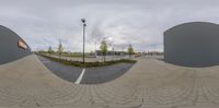 a spherical photo of some building outside and it looks as if in fisheye effect